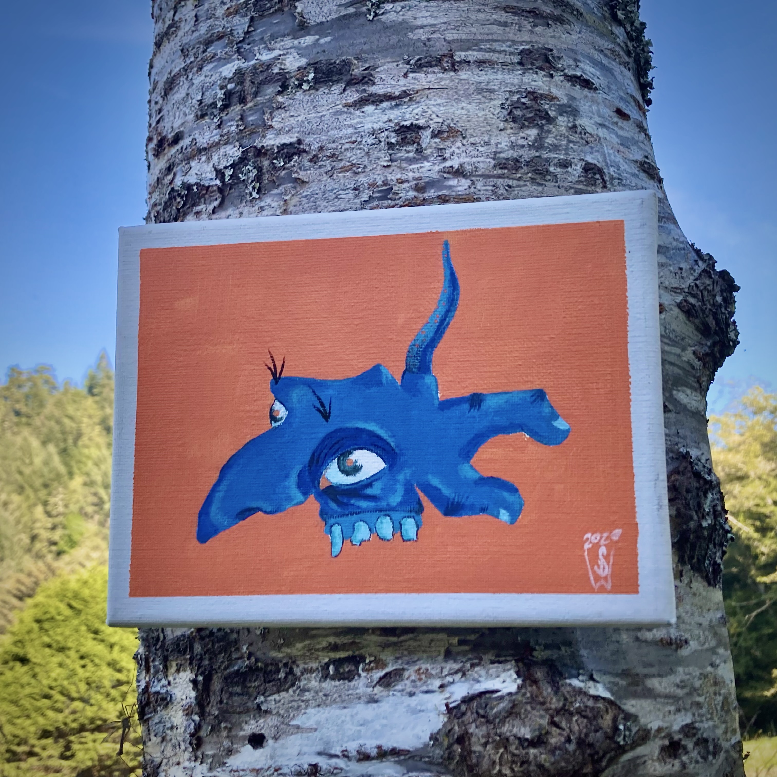 Blue Monster on Orange Background